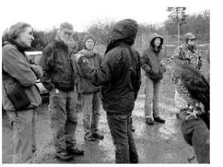 Falconers show a Cooper’s Hawk (right) and an American Kestrel (left).