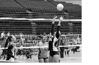 Erin Wilbur delivers a set in the SunDome Volleyball Festival in Yakima