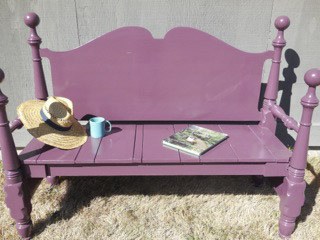 Indoor/outdoor bench repurposed from wooden bedstead.