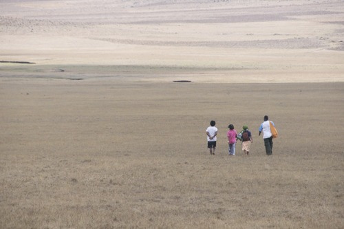 The Bill children make their way towards their 'birt'h village
