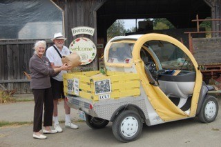 George and Kay Keeler picking up their CSA grain at Horse Drawn Farm in the 'Yellow Gem