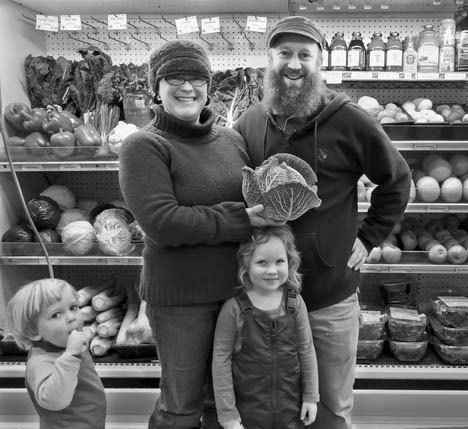 Blossom Grocery owners Jennell and Brian Kvistad and children Samuel and Freda.