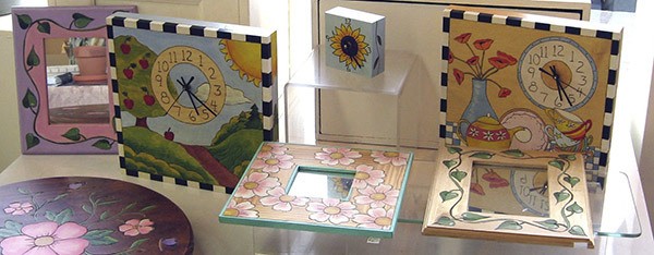 Andria Rhine from San Juan Island who will be attending and selling her fine painted wood and clocks.