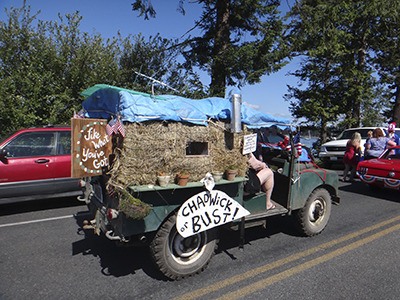 Lopez Fourth of July parade entry – Chadwick or Bust by John and Susan and Savannah and Sara Waugh.