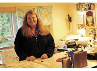 Above: Heather in her studio. Left: Journals made by Heather. Bottom left: Carved gourds.