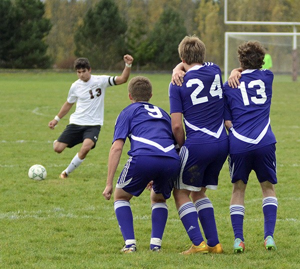 Cosmos Cordova takes a free kick after being fouled by Friday Harbor in the Lobos’ 5-1 loss to the Wolverines. Cordova scored the sole Lopez goal against Friday Harbor and has led Lobos scorers this season.