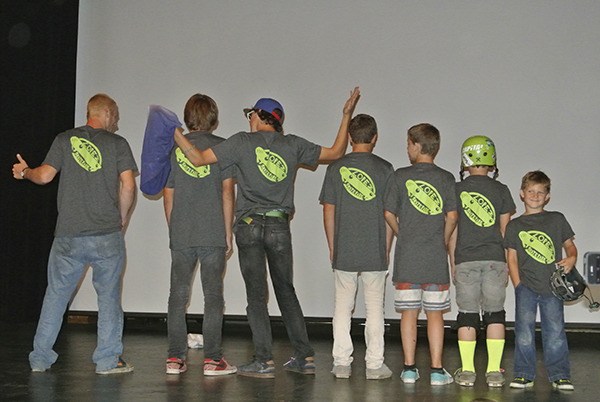 Lopez kids in the skate park T-shirts.