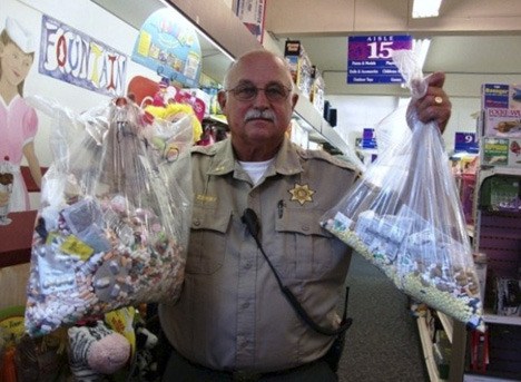 Jon Zerby holds medication collected from last year's medication take back program.