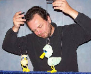 Puppeteer Peter Allen performs “The Little Duckling who Couldn’t Quack