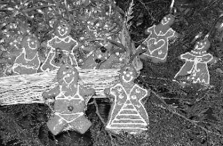 Gingerbread people ornaments at Holly B’s Bakery ready to decorate holiday homes.