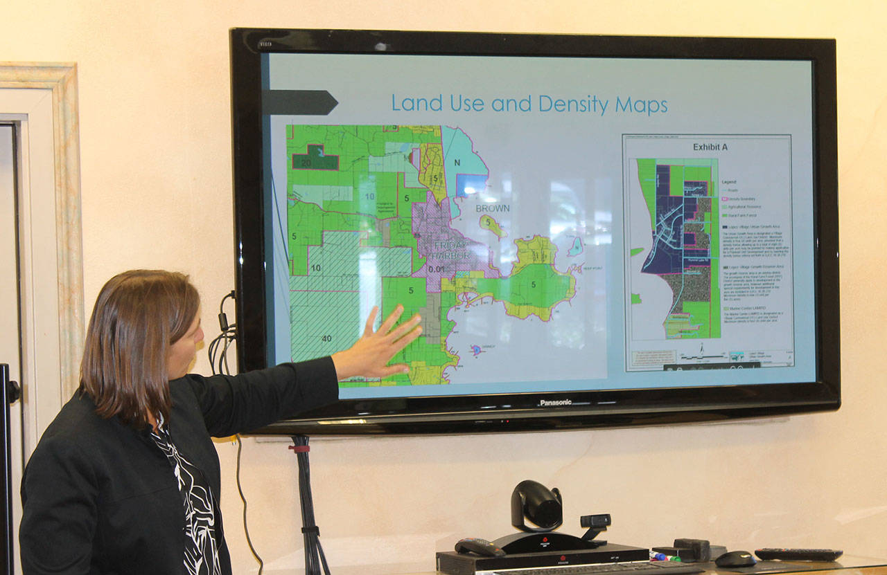 Staff photo/Hayley Day                                San Juan County Community Development Director Erika Shook explains the county&rsquo;s land-use map at the League of Women Voters meeting on Sept. 11.