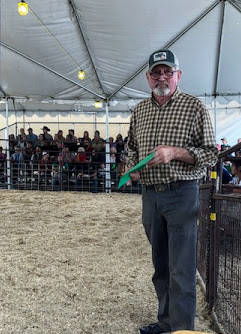 Larry at the 4-H livestock auction. (Contributed photo)