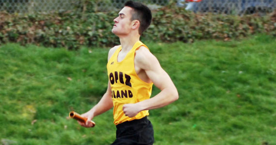 Emmett Lawrence anchors the championship Lopez 4x400 relay team at a meet at Friday Harbor, March 2011.