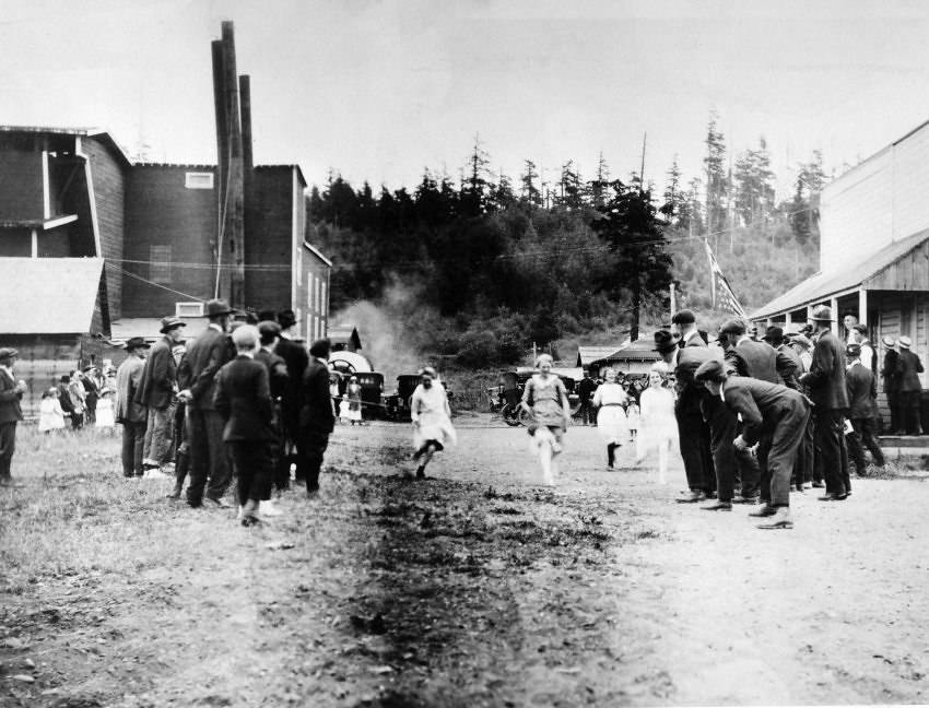 PHOTO COURTESY OF THE LOPEZ ISLAND HISTORICAL MUSEUM ARCHIVE: Fourth of July foot races at Port Stanley  There's no date, but the caption says that's the kelp mill.