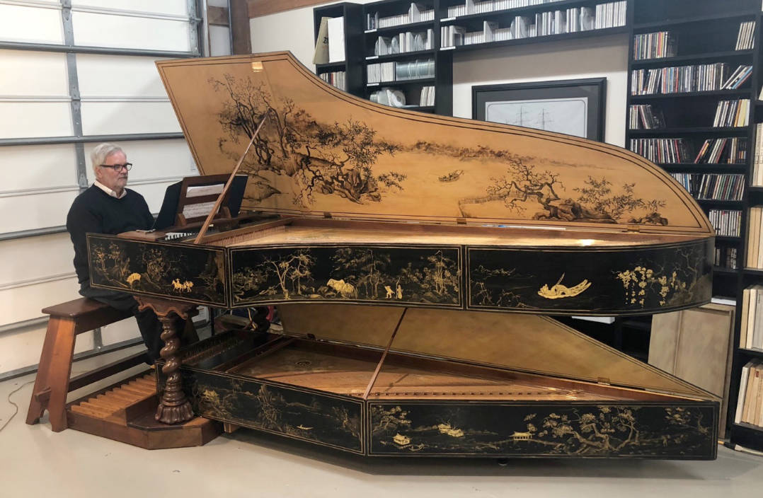 Contributed photo
Roger Sherman demonstrates his harpsichord, built and decorated by Hill and Tyre in the North German Baroque style. The pedal harpsichord beneath the main instrument will not be present at the Lopez Concert.