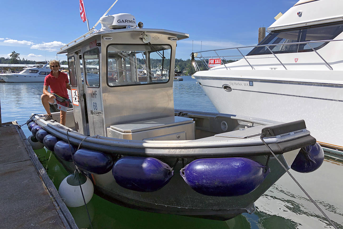 Paul Weyn with Pierce County Pumpout Vessel. (Washington Sea Grant photo)