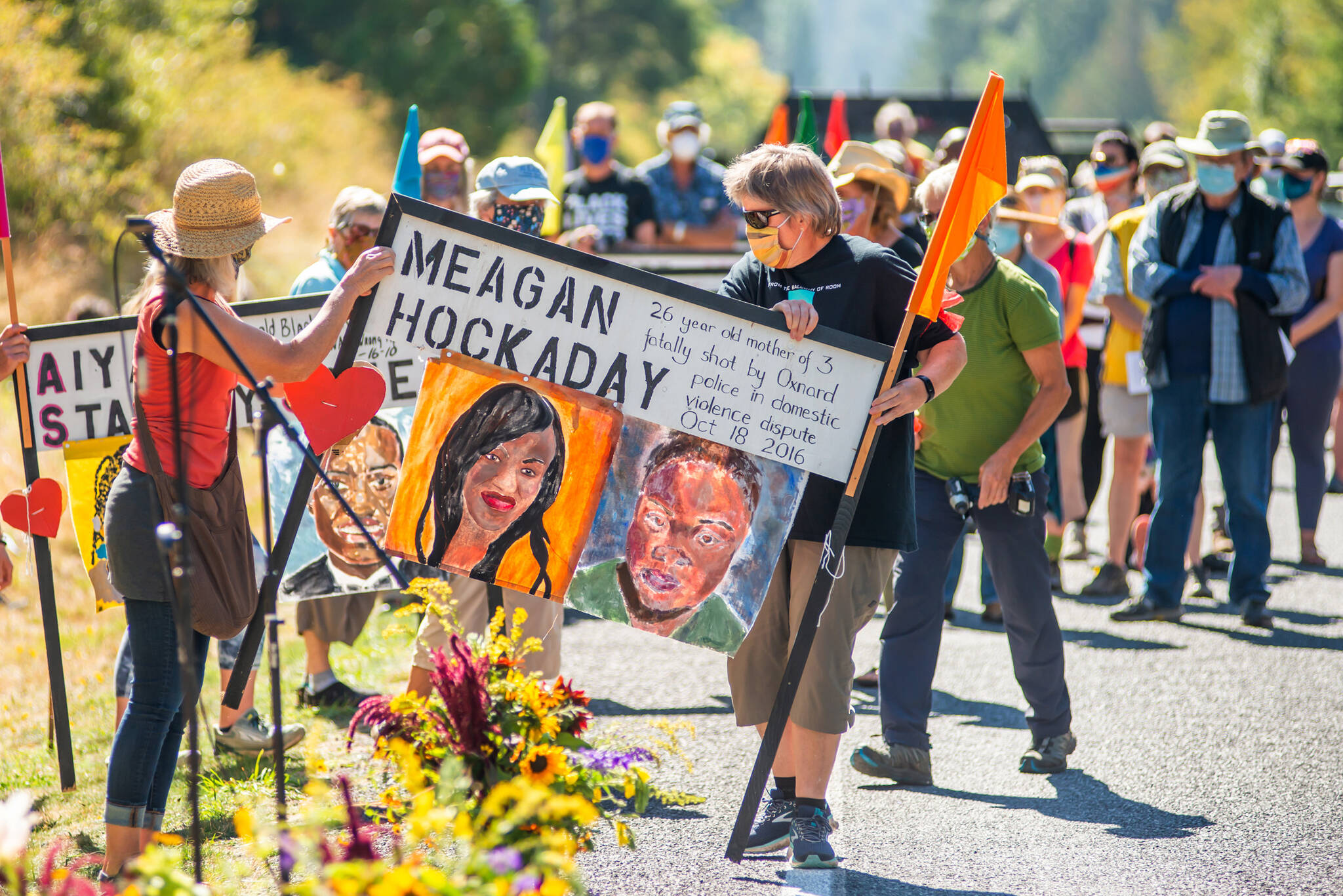 Robert S. Harrison/contributed photo
Lopezians gathered to honor Black lives lost as they respectfully removed memorial signs along the side of Fisherman Bay Road on Sept. 6, 2020.