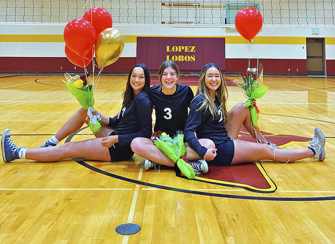Contributed photo
Volleyball seniors Sophie Allen (left), Camille Steckler (center) and Sara Greacen (right) celebrate at season’s end.