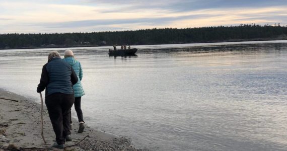 Courtesy photo/ Cynthia Brast
Twp islanders taking a stroll near the cape of San Juan while waterfowl hunters are nearby.