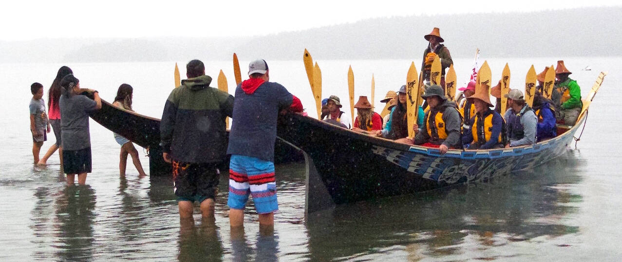 Gene Helfman/contributed photo
Two canoes arrive at Odlin Park during the June 2018 Canoe Journey.