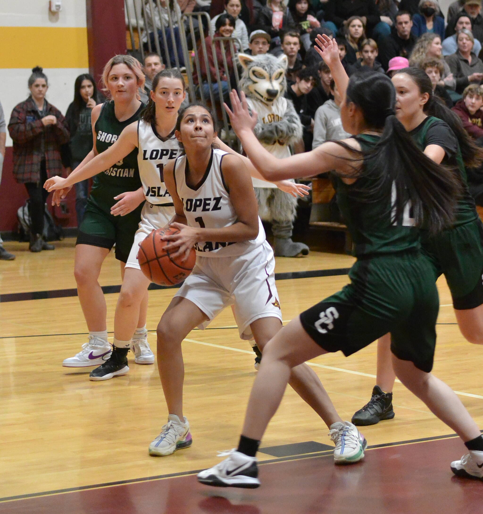 Contributed photo
Melissa Valencia (1) prepares to shoot as Ruby Ervin McLean (11) blocks a defending player in the Lady Lobos’ decisive 33-15 victory over Shoreline Christian.