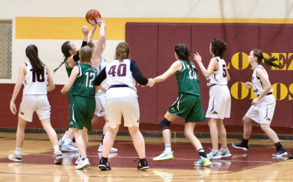 Contributed photo by Gene Helfman
Dani Arnott brings down a rebound against Cedar Park as (left to right) Glory Westervelt (10), Betty Burt (40), Josie Luckhurst-Slattery (5), and Ruby Ervin-McLean help in defense. Lopez defeated the Lions 33-17, for their third victory of the year.