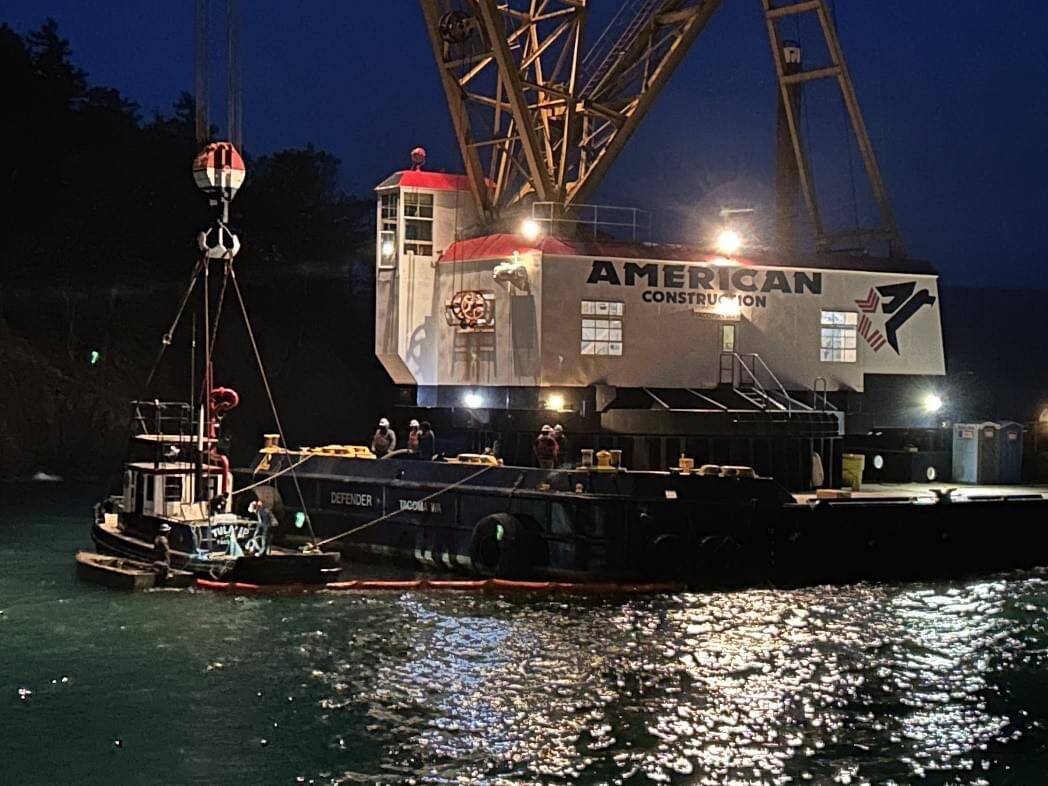 Contributed photo.
The partially submerged Tugboat Tulalip is prepared for lifting from the waters near the Lopez ferry terminal Wednesday night.