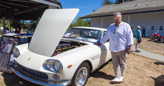 Joe Blecovson photo 
Ray Russo standing by his 1962 Ferrari 330 GT 2+2 - Enzo Ferrari’s former personal vehicle