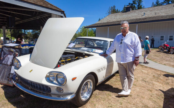 Joe Blecovson photo 
Ray Russo standing by his 1962 Ferrari 330 GT 2+2 - Enzo Ferrari’s former personal vehicle
