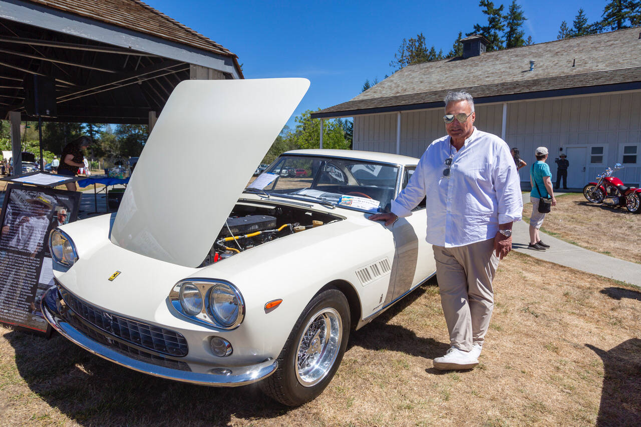 Joe Blecovson photo 
Ray Russo standing by his 1962 Ferrari 330 GT 2+2 - Enzo Ferrari’s former personal vehicle