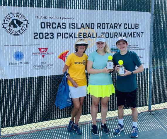 Tournament director Linda Hamilton with Group B Mixed Doubles second-place winners Monica
Connell and Ethan Brazil/Contributed photo