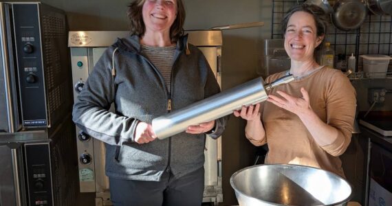 Gretchen Wing photo
Stephanie Smith passes the rolling pin to Margot Case.