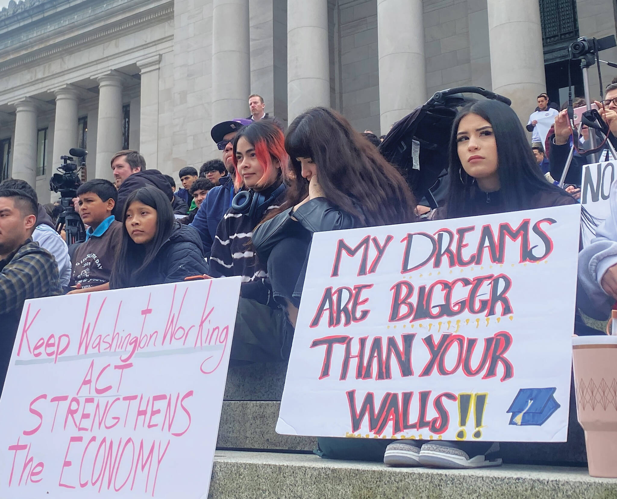 Mary Feusner photo.
Protesters held up signs in support of Latino culture and immigrants to the United States.