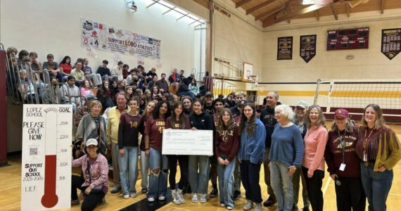 Sara Wysocki photo. Lopez Island School District’s Associated Student Body and Principal Linda Martin received a $140,000 donation from Lopez Island Education Foundation, with its board of trustees and donors, teachers and students in attendance on Sept. 9.