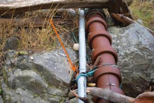 Contributed photo/Public records request                                CenturyLink&rsquo;s fiber cable is connected to OPALCO&rsquo;s power cable with rope and wire near OPALCO&rsquo;s Pear Point substation.