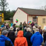 Contributed photo/ Robert S. Harrison Photography                                An audience watches as the ground is broken for the new LIFRC/Lopez Fit building on March 29.