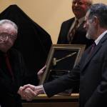 Staff photo/Hayley Day                                John Chessell, president of the San Juan County Bar Association, presents retiring San Juan County Superior Court Judge Donald Eaton with a plaque.