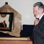 Staff photo/Hayley Day                                San Juan County Superior Court Judge Donald Eaton smiles in front of his portrait.
