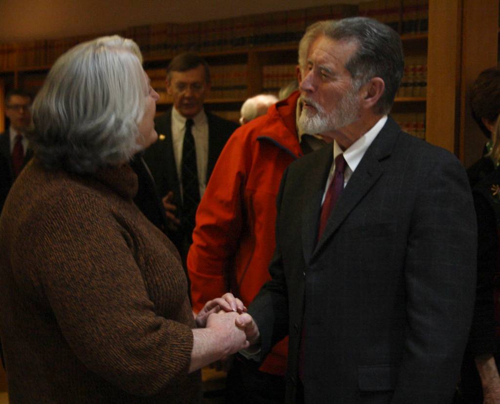 Staff photo/Hayley Day                                Well wishers congratulate San Juan County Superior Court Judge Donald Eaton at his retirement party on Dec. 15.
