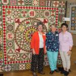 Contributed photo                                Taken at woodman Hall, Lopez Island in April 2017. Karen Alexander (Lopez), Anne Dawson (Lopez), Barbara Menasian of Connecticut (owner of the original antique 1876 Centennial Quilt that Karen Alexander found on-line in a quilt history discussion group May 2015).