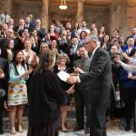 Gov. Jay Inslee reads an orca proclamation that declares June 2019 as Orca Action Month. He read the proclamation immediately after he signed five bills that will protect, aid, grow orca and salmon population in Salish Sea. (Office of the Governor photo)