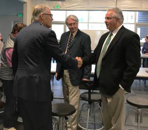 Contributed photo/OPALCO                                OPALCO general manager Foster Hildreth and board president Vince Dauciunas meet with Gov. Inslee.