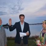 Contributed photos                                 Ross and Rebecca MacDonald married on July 4 with officiant Dave Sather (center).