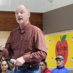 Lopez Island School District Board Chairman John Helding speaks to a room full of Lopezians at the Sept. 25 school board meeting. <em>(Mandi Johnson/staff photo)</em>