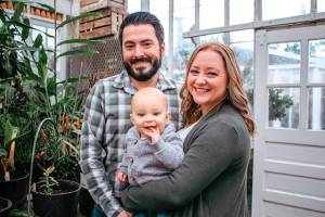 TIFFENY MICHAL PHOTOGRAPHY/CONTRIBUTED PHOTO
Maggie Schmidt with husband Lucian and their son.