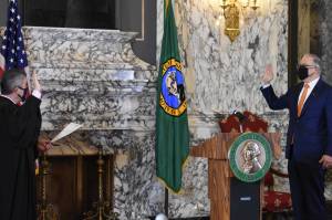 Gov. Jay Inslee being sworn in for his third term with Chief Justice Steven González.. (Gov. Jay Inslees Office/Contibuted photo)