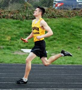 Emmett Lawrence anchors the championship Lopez 4x400 relay team at a meet at Friday Harbor, March 2011.