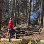 Contributed photo|Fire Marshall RJ Myers observes CCC conservation burn on Squaw Bay Road, Shaw Island.