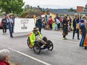 Barbara Paulsen/Contributed photo
A huge crowd made signs and marched in the Lopez Island Fourth of July parade.