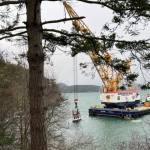 Contributed photo.
The partially submerged Tugboat Tulalip is suspended near the Lopez ferry terminal in preparation for removal.